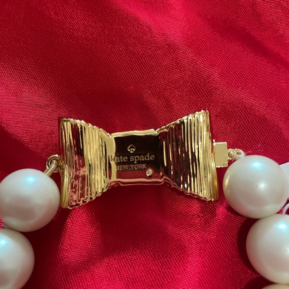 SOLD ON MERCARI!!
NWT-Kate spade gold ‘all wrapped up in pearls’ bow bracelet - Picture 2 of 4